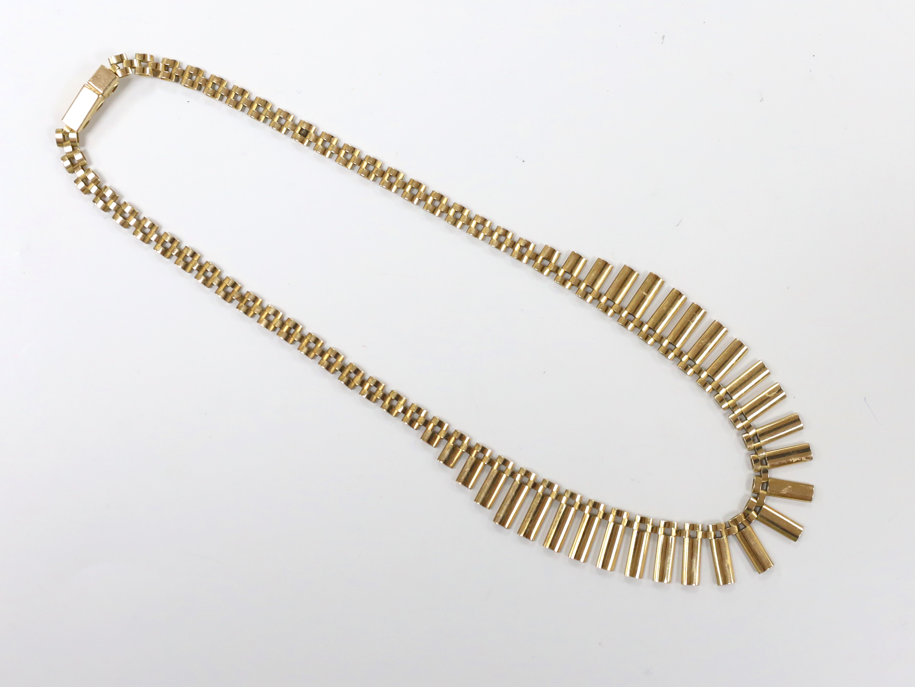 A 1970's 9ct yellow gold fringe necklace, 40cm, 20 grams.